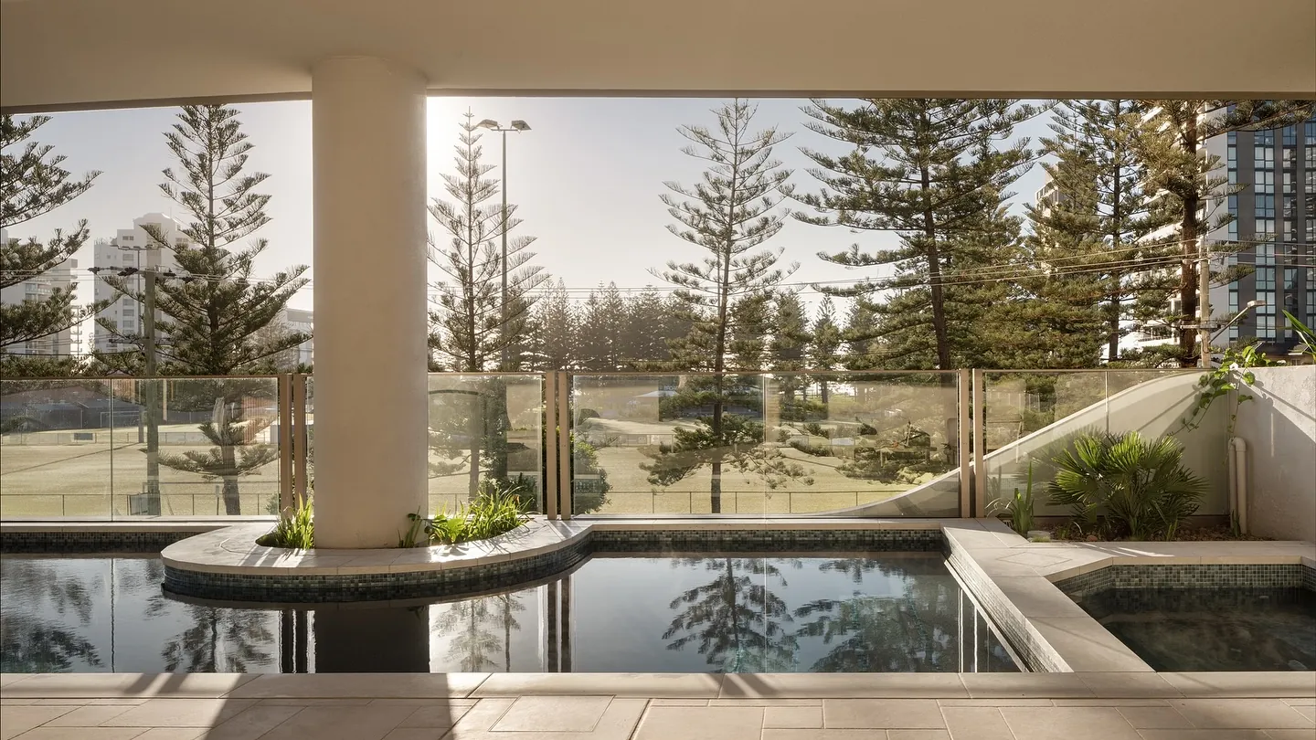 Mosaic-tiled pool and spa at a Broadbeach high-rise, tiled by Gray Tiling