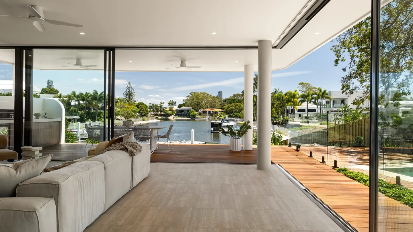 Travertine-look tiles running from the front entry through to the rear deck at a Mermaid Beach home