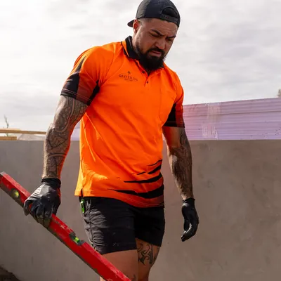 Shane on site with a level