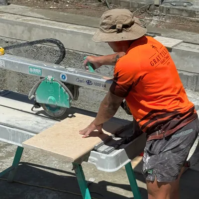 Cutting tiles on a wet saw